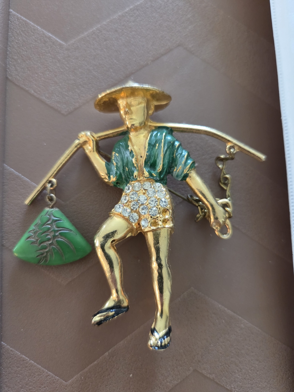 Gold-Tone Figurine Brooch with Green Enamel Details